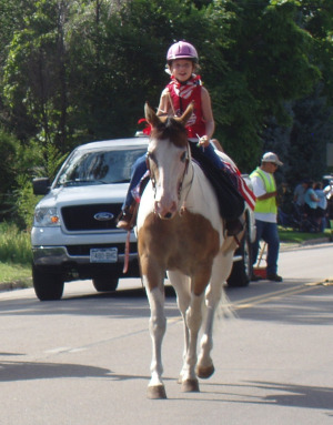 This is me riding my horse in the Fourth of July Parade!